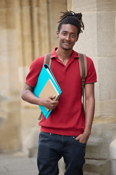 portrait-male-student-carrying-files-600nw-2333799813